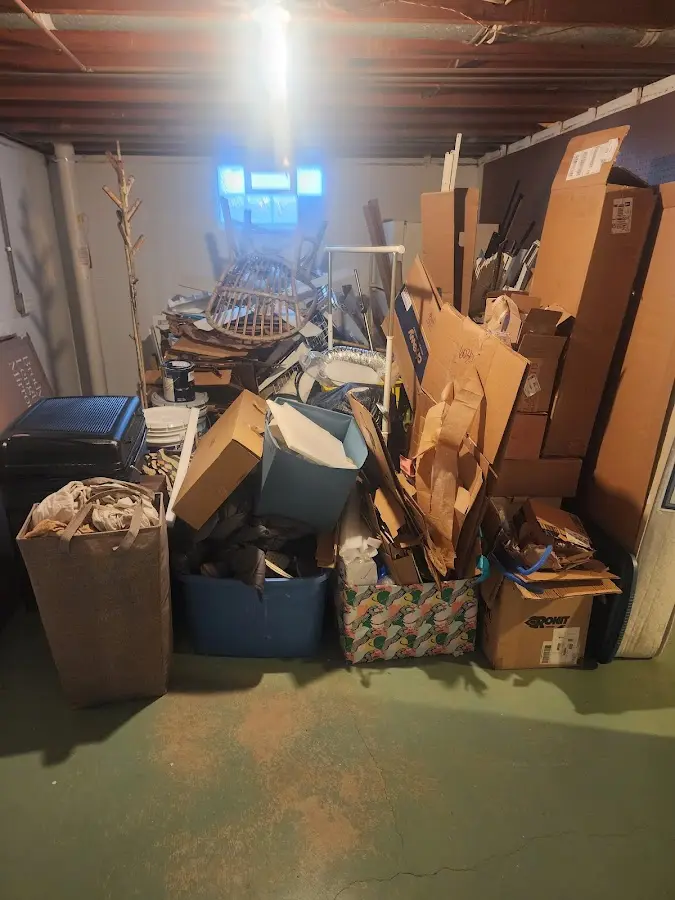 Roll-off dumpster container at job site for 6 Yard Dumpster Rental in East Windsor